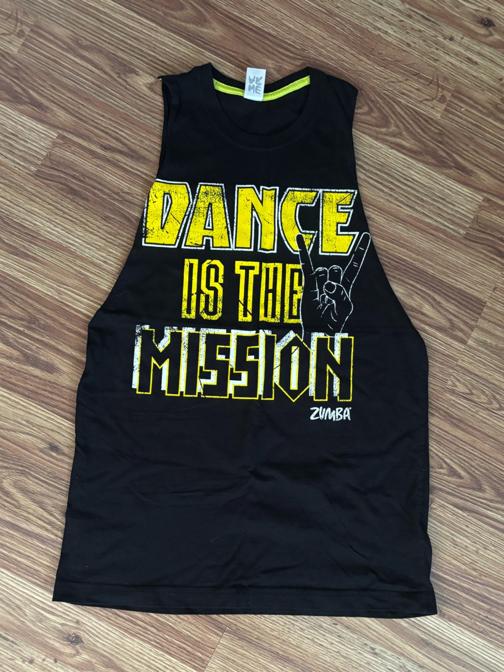 Zumba Black Muscle Tank — Yellow Graphic "Dance Is The Mission"
